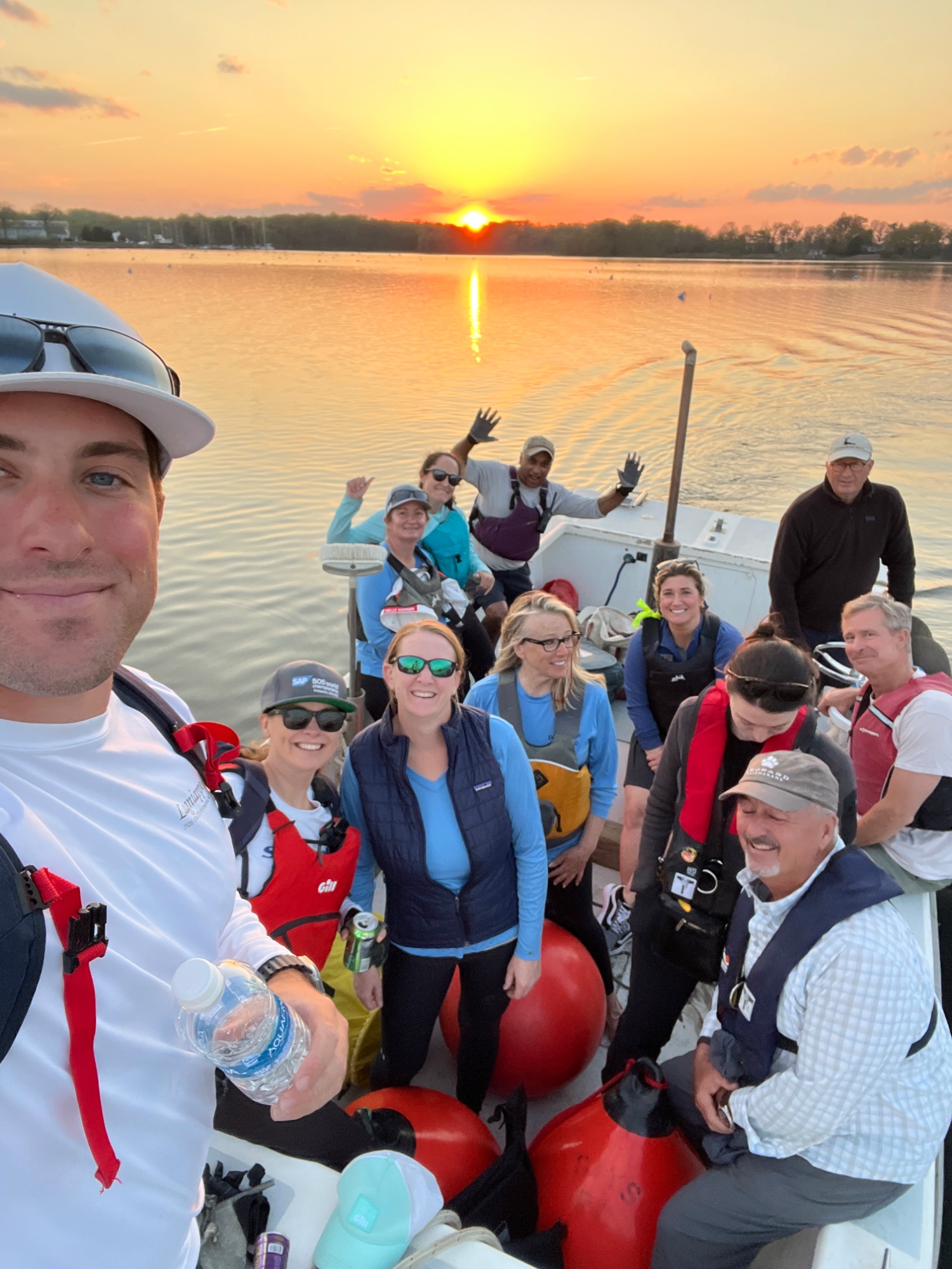 Crew enjoying a sunset sail on the Chesapeake Bay