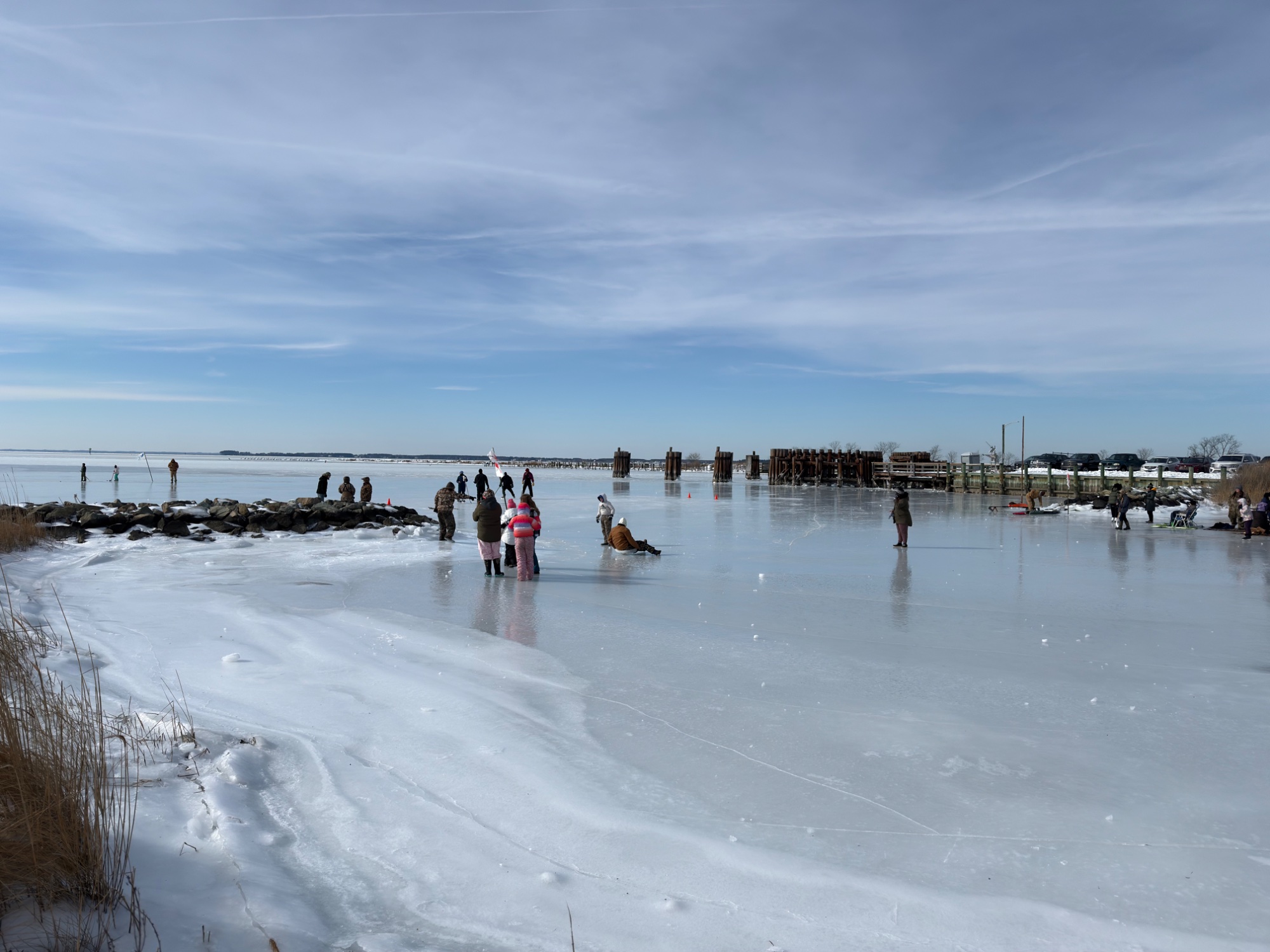Wide view of Claiborne Landing with ice boaters on the frozen Chesapeake Bay